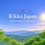 Centered editorial image of Rikka Japan with fresh green mountains and bright early summer sunlight, representing the beginning of summer in Japan